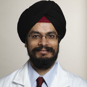 Dr. Mandip Dhamoon