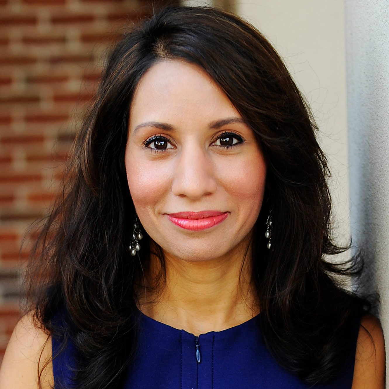 Dr. Tasneem Bhatia