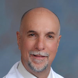 Dr. Carlos E. Santiago, MD